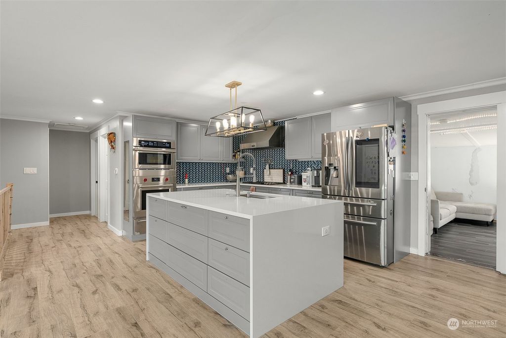 Photo of 3519 NE 8th Street, Renton, WA 98056 (MLS # 2175349)