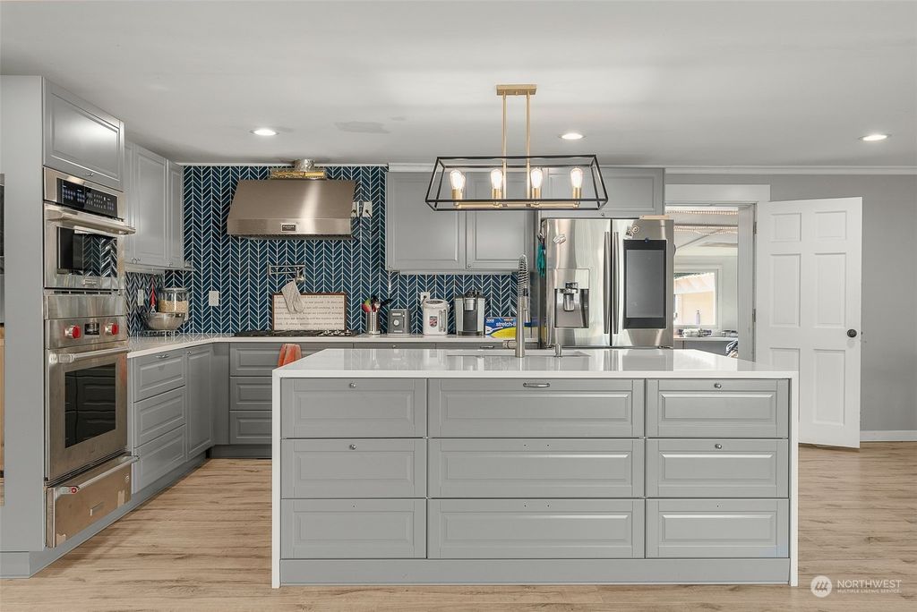 Photo of 3519 NE 8th Street, Renton, WA 98056 (MLS # 2175349)