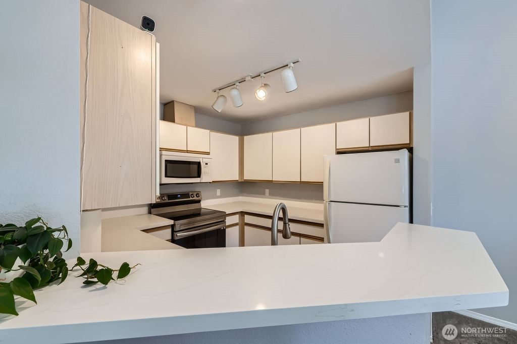 Photo of 9210 Market Place #F202, Lake Stevens, WA 98258 (MLS # 2391005)