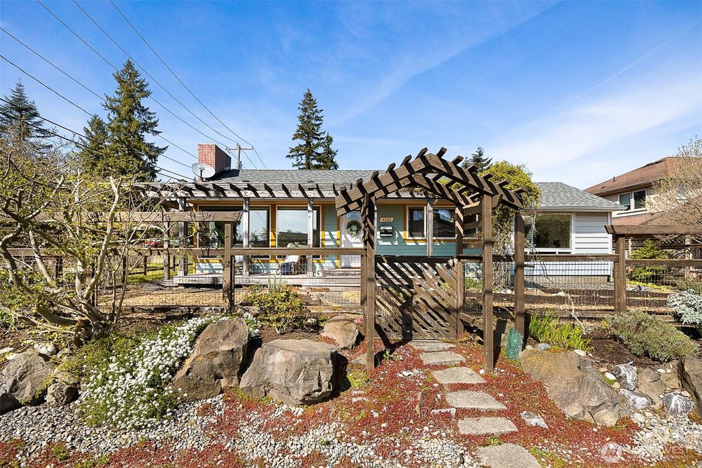 Photo of 4126 SW 106th Street, Seattle, WA 98146 (MLS # 2355920)