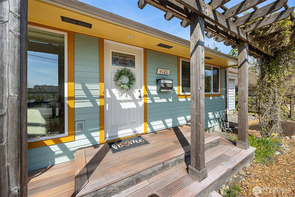 Photo of 4126 SW 106th Street, Seattle, WA 98146 (MLS # 2355920)