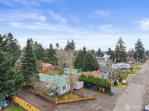 Photo of 11040 14th Avenue SW, Seattle, WA 98146 (MLS # 2476698)