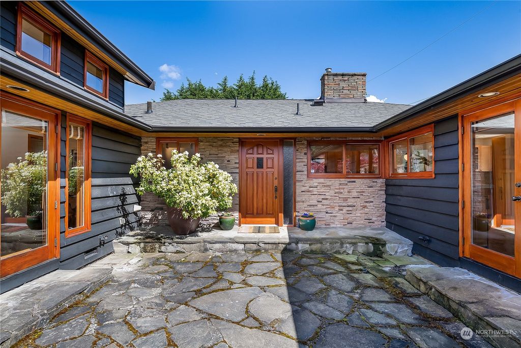 Photo of 12500 12th Avenue NW, Seattle, WA 98177 (MLS # 2230416)