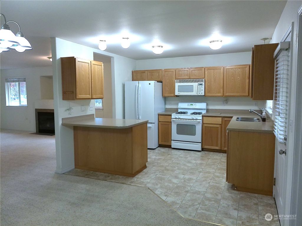 Photo of 834 Village Way, Monroe, WA 98272 (MLS # 2306657)