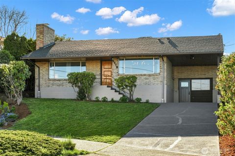 Photo of 3719 38th Avenue SW, Seattle, WA 98126 (MLS # 2505504)