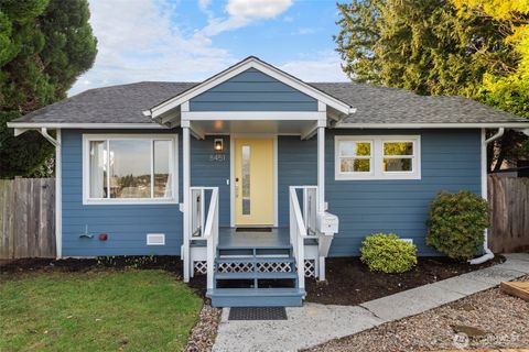 Photo of 8451 30th Avenue SW, Seattle, WA 98126 (MLS # 2471911)