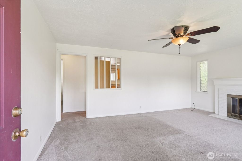 Photo of 11515 26th Avenue SW, Seattle, WA 98146 (MLS # 2391581)