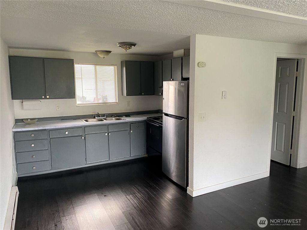 Photo of 1123 Lindstrom Street, Aberdeen, WA 98520 (MLS # 2489135)