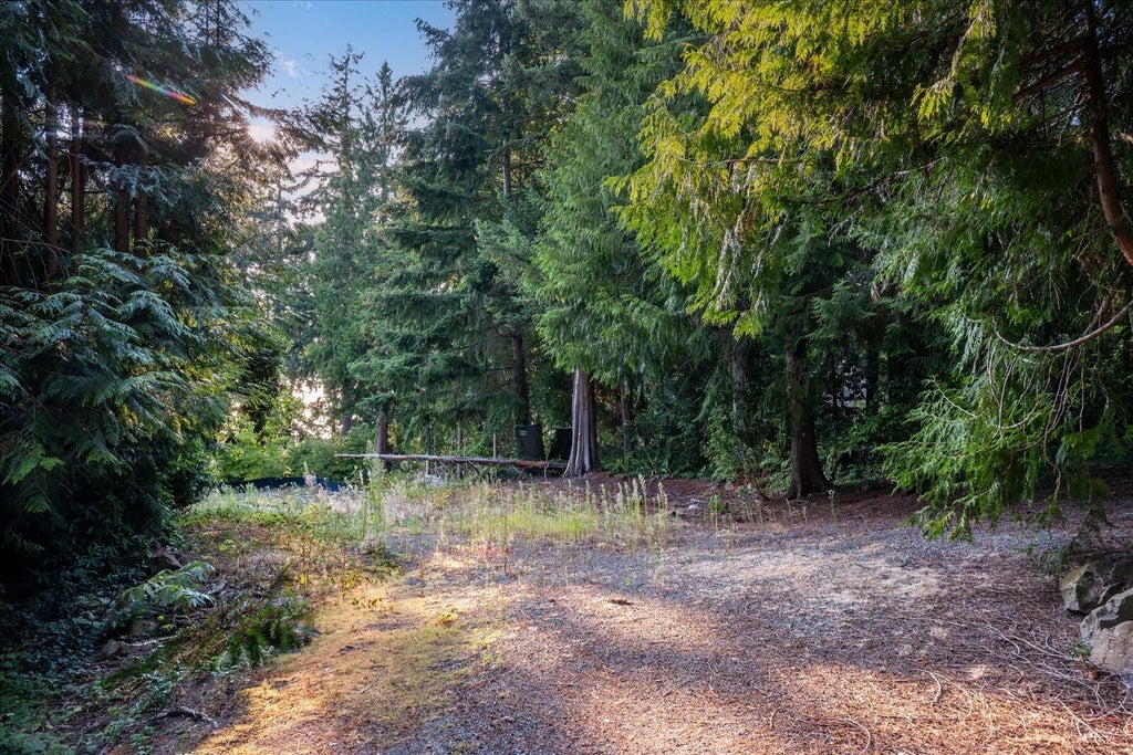 Photo of 2845 103rd Avenue SE, Beaux Arts, WA 98004 (MLS # 2597227)