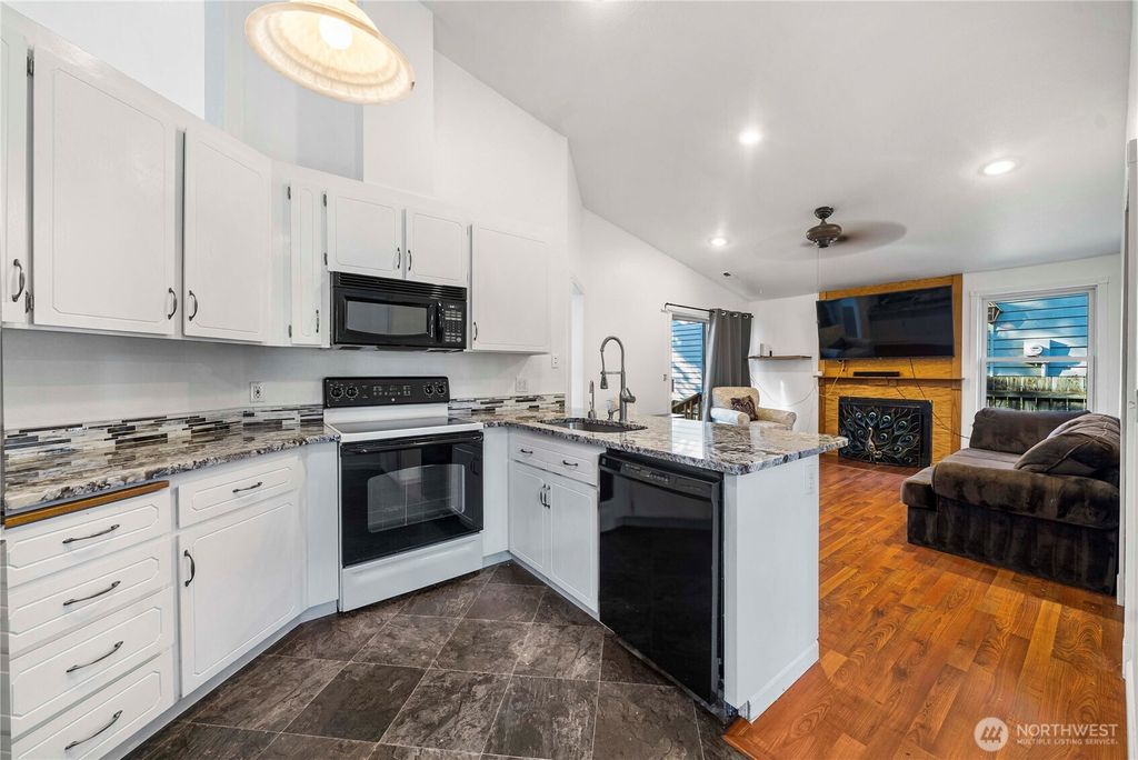 Photo of 22227 126th Place SE, Kent, WA 98031 (MLS # 2408334)