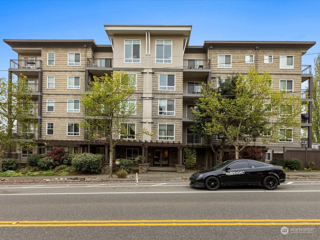 Photo of 3015 SW Avalon Way #407, Seattle, WA 98126 (MLS # 2061814)
