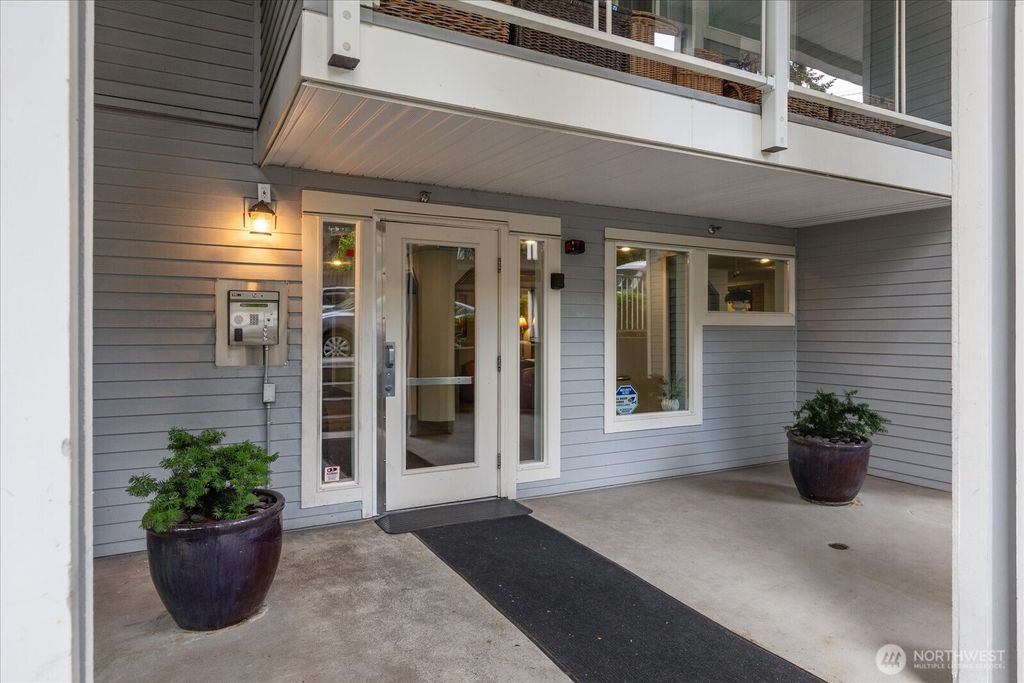Photo of 3318 30th Avenue SW #B402, Seattle, WA 98126 (MLS # 2388363)