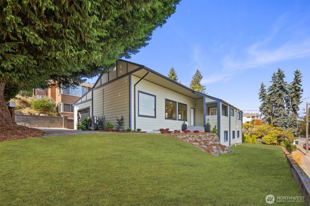 Photo of 3205 25th Avenue W, Seattle, WA 98199 (MLS # 2437990)