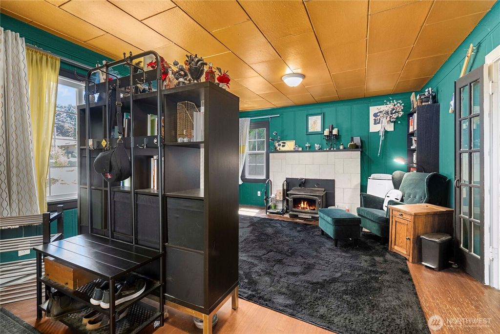 Photo of 12027 10th Avenue S, Seattle, WA 98168 (MLS # 2408991)