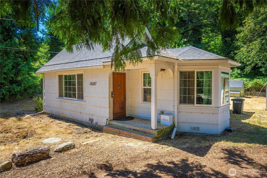 Photo of 12027 10th Avenue S, Seattle, WA 98168 (MLS # 2408991)