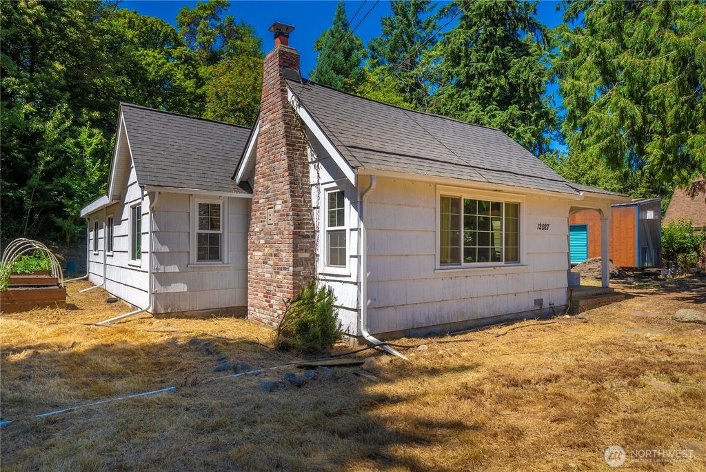 Photo of 12027 10th Avenue S, Seattle, WA 98168 (MLS # 2408991)