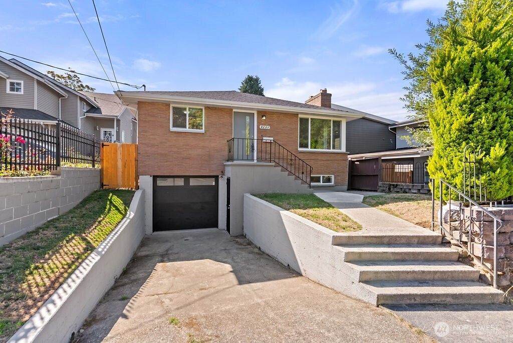 Photo of 4231 S Graham Street, Seattle, WA 98118 (MLS # 2437649)