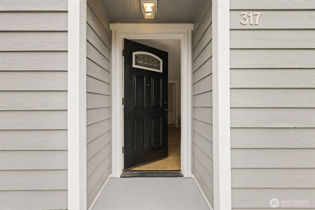 Photo of 317 SW 124th Street, Seattle, WA 98146 (MLS # 2494254)