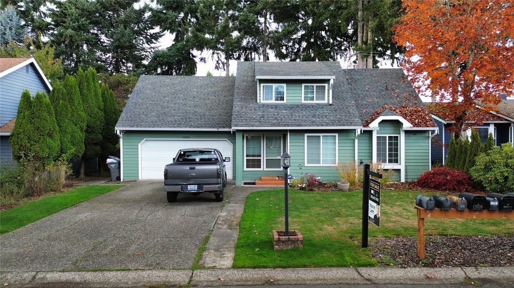 Photo of 12626 SE 317th Street, Auburn, WA 98092 (MLS # 2584887)