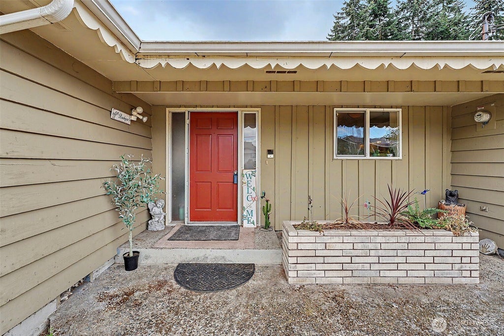 Photo of 8718 107th St E ST, Puyallup, WA 98373 (MLS # 2574640)