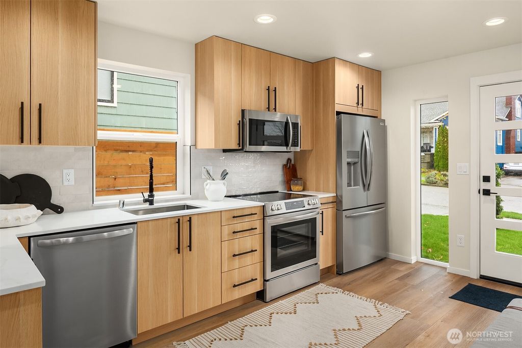 Photo of 6503 Dibble Avenue NW, Seattle, WA 98107 (MLS # 2446057)