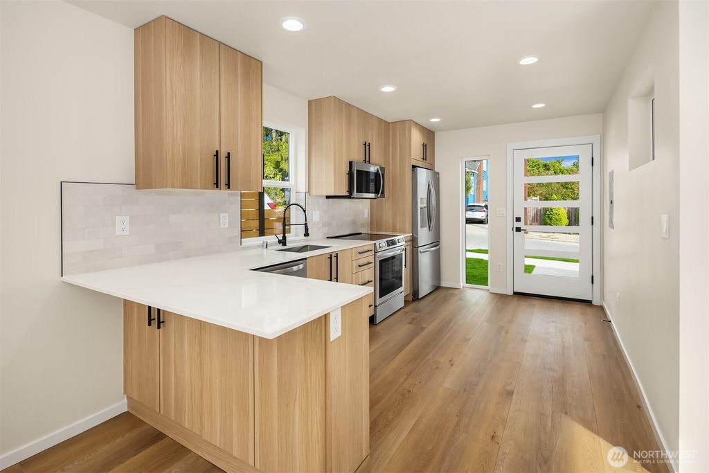 Photo of 6503 Dibble Avenue NW, Seattle, WA 98107 (MLS # 2446057)