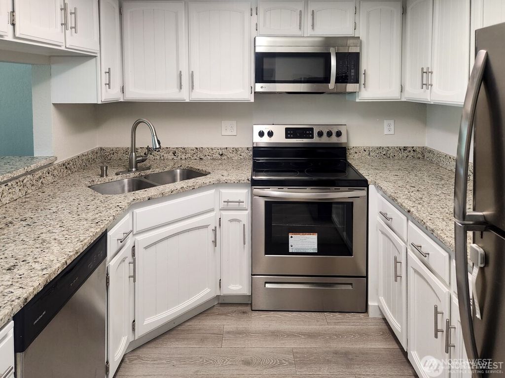 Photo of 2611 NE 4th St #234, Renton, WA 98056 (MLS # 2497254)