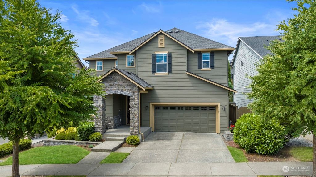 Photo of 9129 Ash Avenue SE, Snoqualmie, WA 98065 (MLS # 2076561)