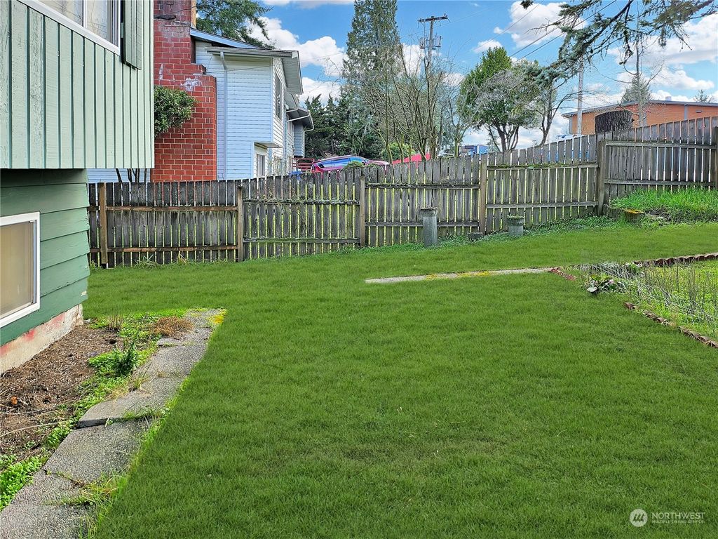 Photo of 11222 56th Avenue S, Seattle, WA 98178 (MLS # 2214032)