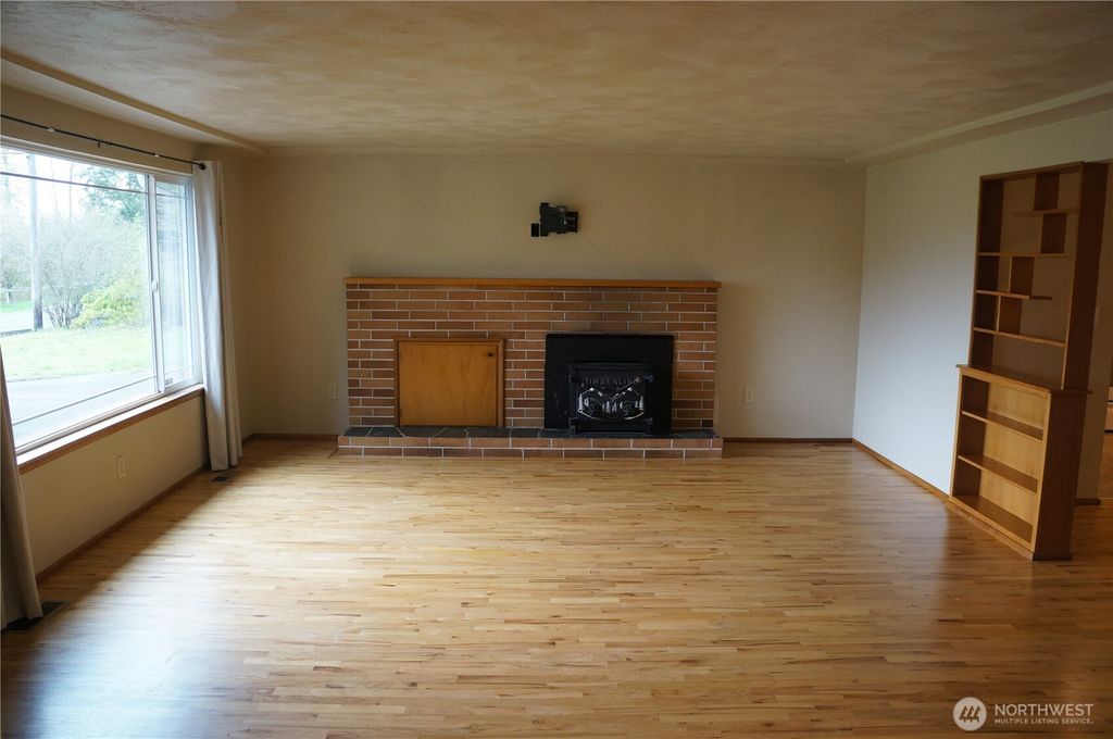 Photo of 12019 Bingham Ave Ave E, Tacoma, WA 98446 (MLS # 2499896)