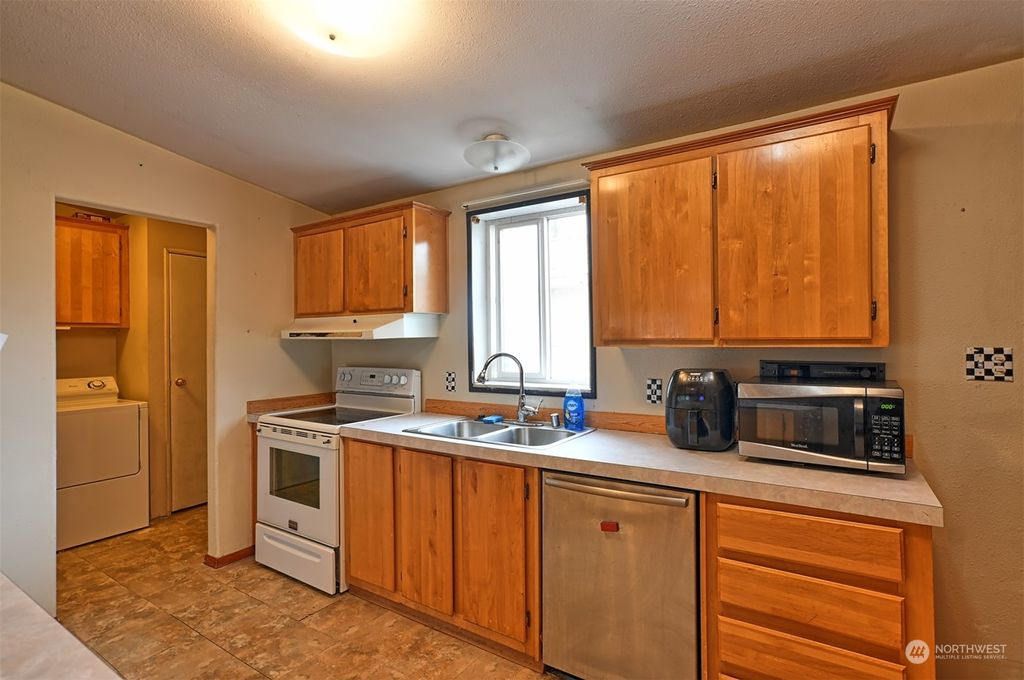 Photo of 12727 W Macs Loop Road, Granite Falls, WA 98252 (MLS # 2053617)