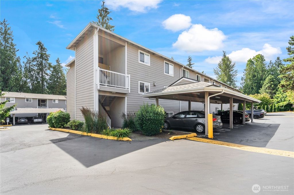 Photo of 1144 N 198th Street #E201, Shoreline, WA 98133 (MLS # 2402838)
