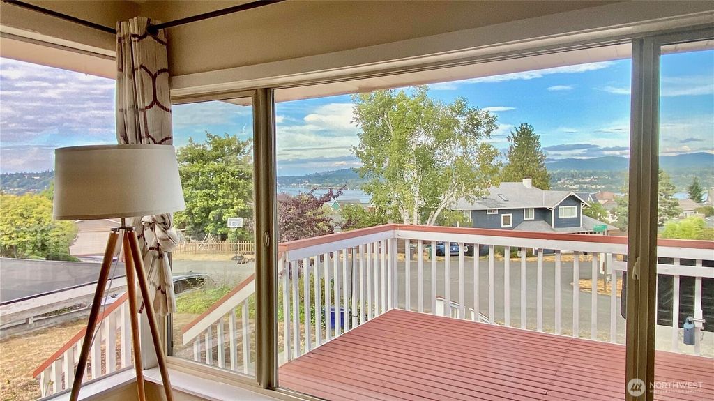 Photo of 11009 Woodward Avenue S, Seattle, WA 98178 (MLS # 2410882)