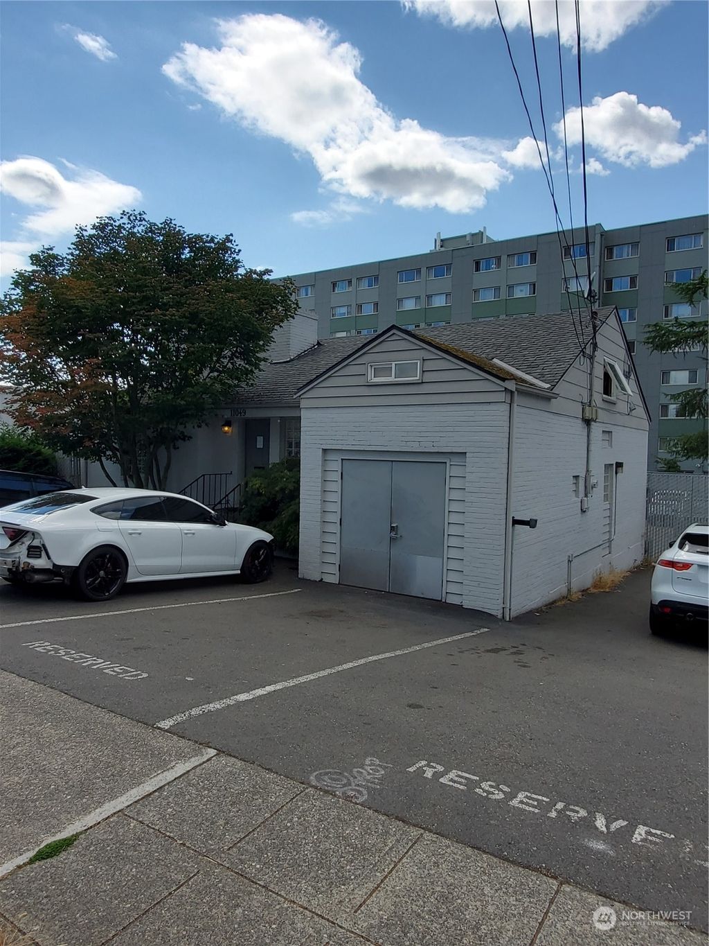 Photo of 11049 8th Avenue NE, Seattle, WA 98125 (MLS # 2272438)