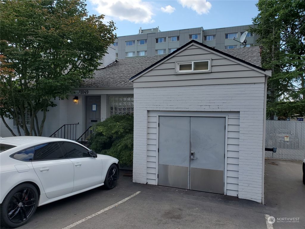 Photo of 11049 8th Avenue NE, Seattle, WA 98125 (MLS # 2272438)