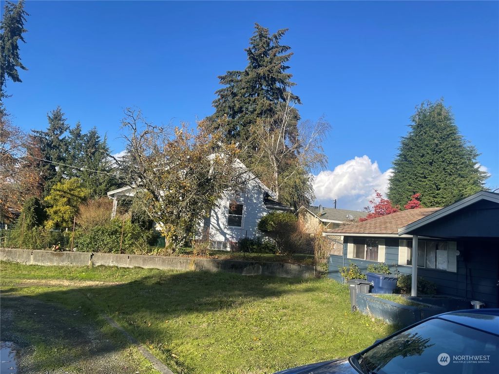 Photo of 14226 Military Road S, Tukwila, WA 98168 (MLS # 2308319)