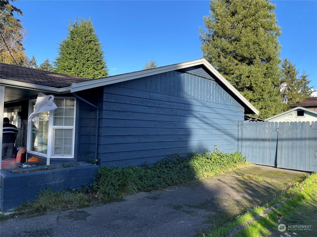 Photo of 14226 Military Road S, Tukwila, WA 98168 (MLS # 2308319)