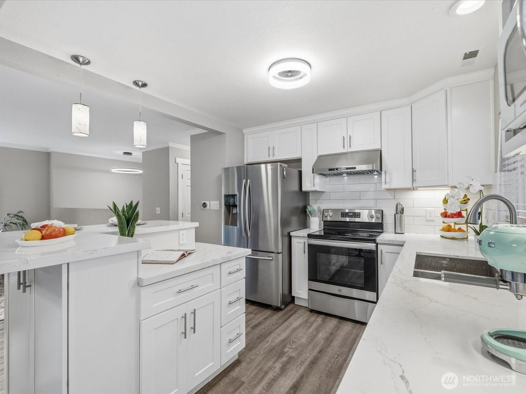 Photo of 12026 NE 99th Lane, Kirkland, WA 98033 (MLS # 2487945)