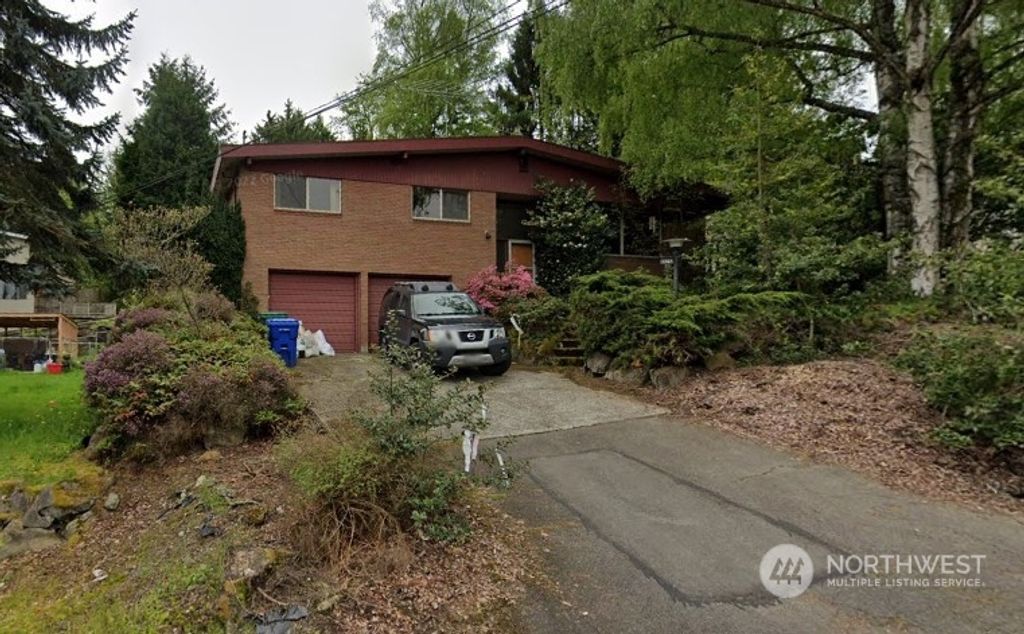 Photo of 3263 N 103rd Street, Seattle, WA 98125 (MLS # 2183352)