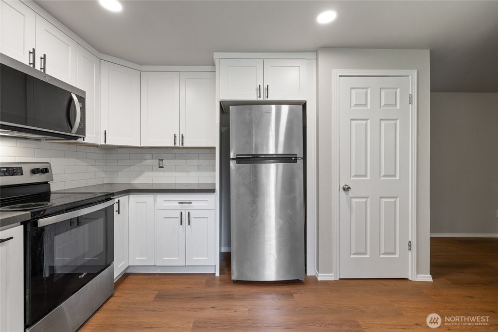 Photo of 10214 13th Avenue Ct E #E, Tacoma, WA 98445 (MLS # 2524311)