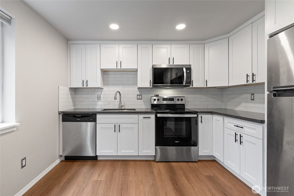 Photo of 10214 13th Avenue Ct E #E, Tacoma, WA 98445 (MLS # 2524311)