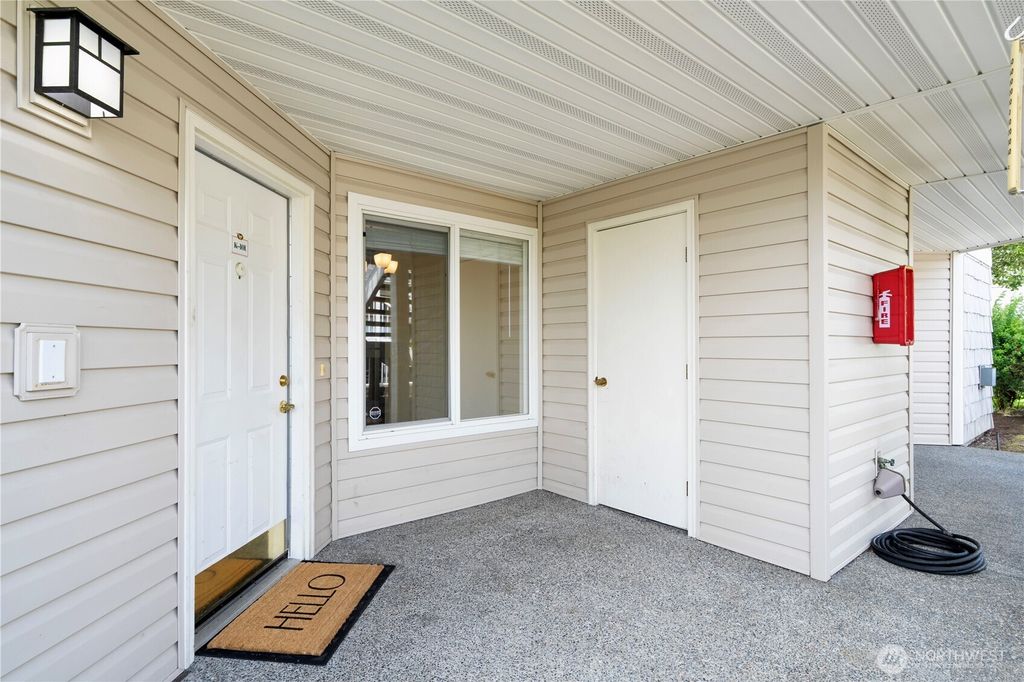 Photo of 11130 SE 208th Street #K101, Kent, WA 98031 (MLS # 2396568)