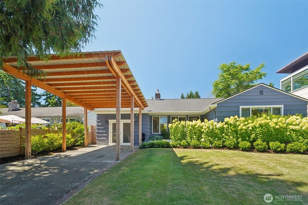 Photo of 11409 34th Avenue SW, Seattle, WA 98146 (MLS # 2414121)