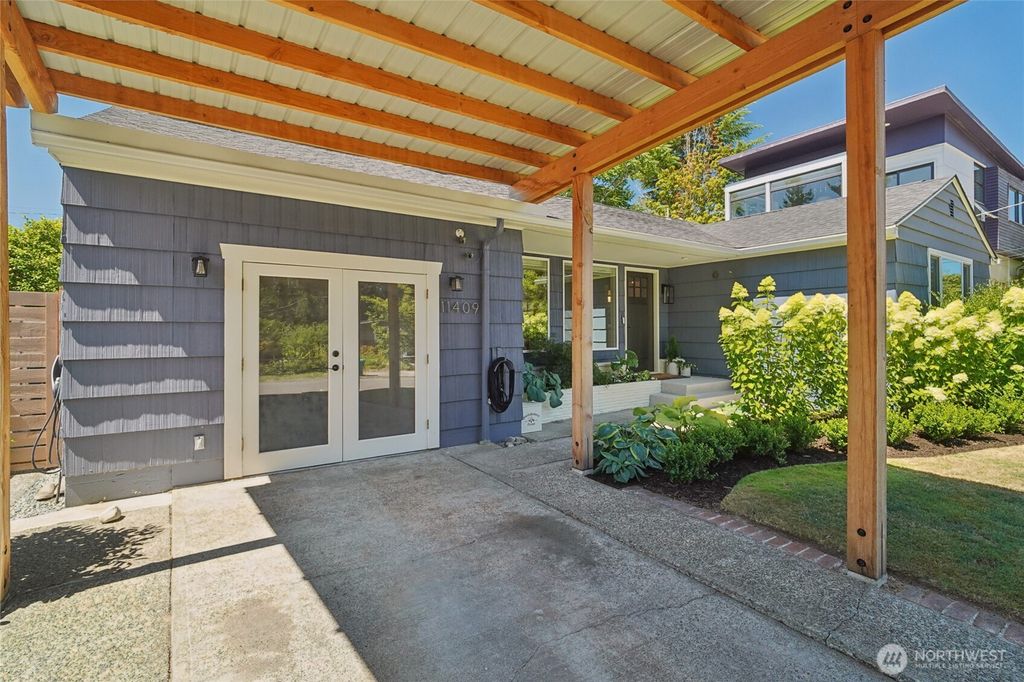 Photo of 11409 34th Avenue SW, Seattle, WA 98146 (MLS # 2414121)
