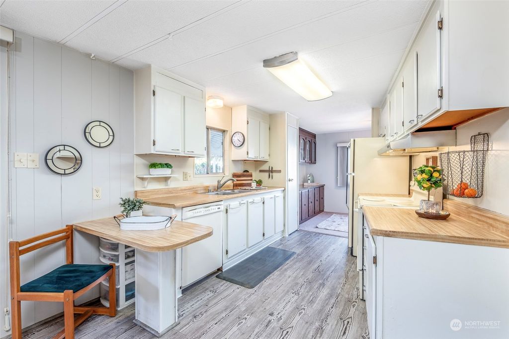 Photo of 11436 SE 208th Street #47, Kent, WA 98031 (MLS # 2045283)