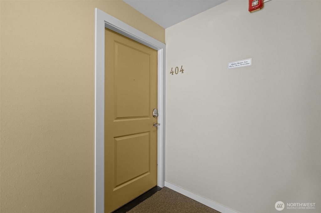 Photo of 845 NE 125th Street #404, Seattle, WA 98125 (MLS # 2531256)