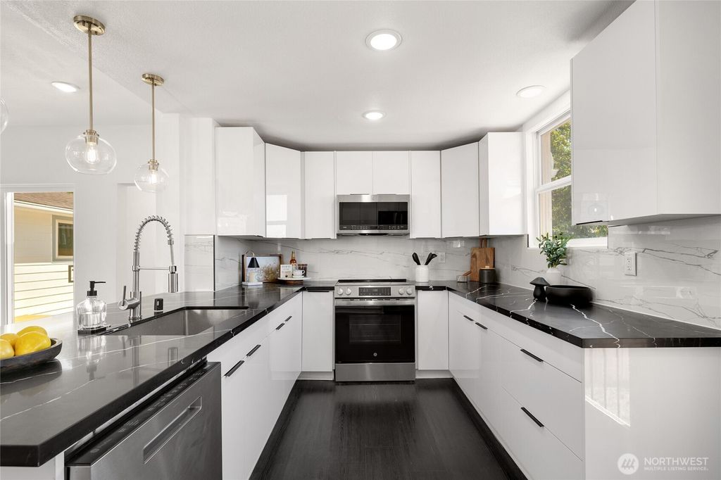 Photo of 3907 S Angel Place, Seattle, WA 98118 (MLS # 2415341)