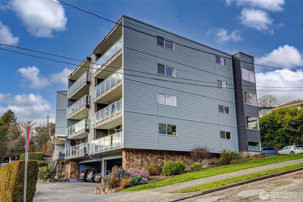 Photo of 500 W Olympic Place #101, Seattle, WA 98119 (MLS # 2331877)
