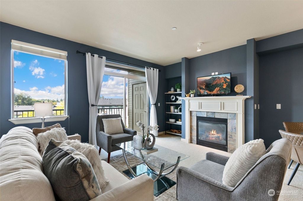 Photo of 6800 132nd Place SE #E203, Newcastle, WA 98059 (MLS # 2160525)