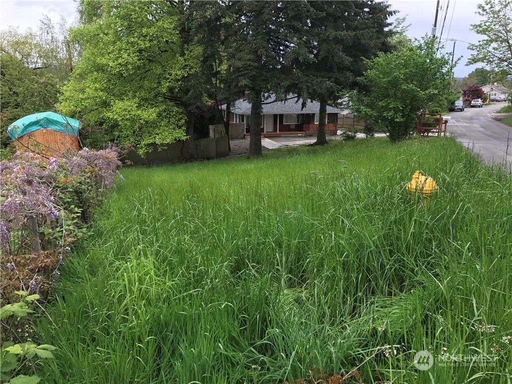 Photo of 10460 22nd Place S, Seattle, WA 98168 (MLS # 2199647)